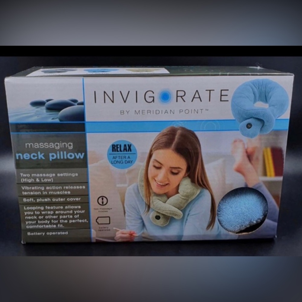 Invigorate messaging neck pillow. New without box.